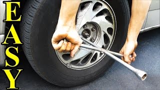 How to Change a Tire plus jacking it up [upl. by Dnalel]