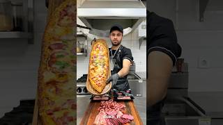 Turkish pizza içli pide with sausage and mozzarella cheese recipe🍕pizza cooking recipes shorts [upl. by Aikas]