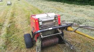 Kubota compact tractor and mini round baler [upl. by Tombaugh]